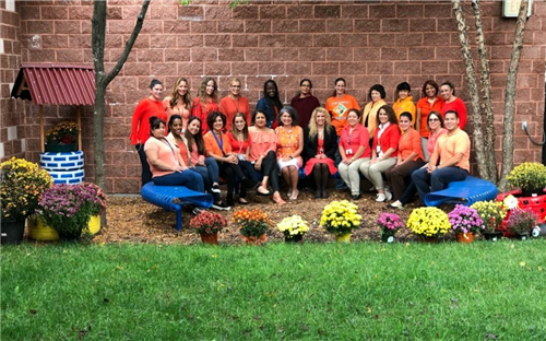 staff in orange 