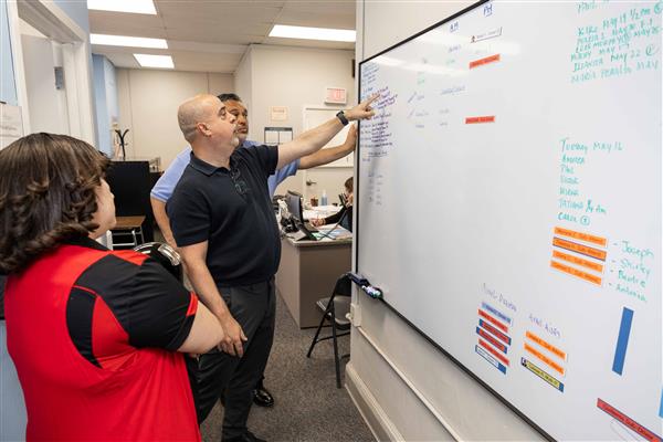 Board of Education President Iliana Chevres Visits Transportation Department